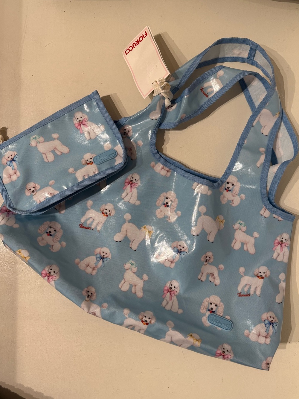 Fiorucci S/S26 Poodle-Print Tote and matching pouch